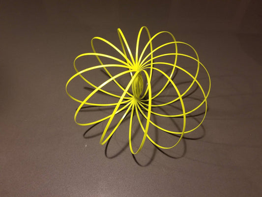 Glozi - Flow Toy - Glowing Yellow - The Weitzman Museum Store - GZ01Y