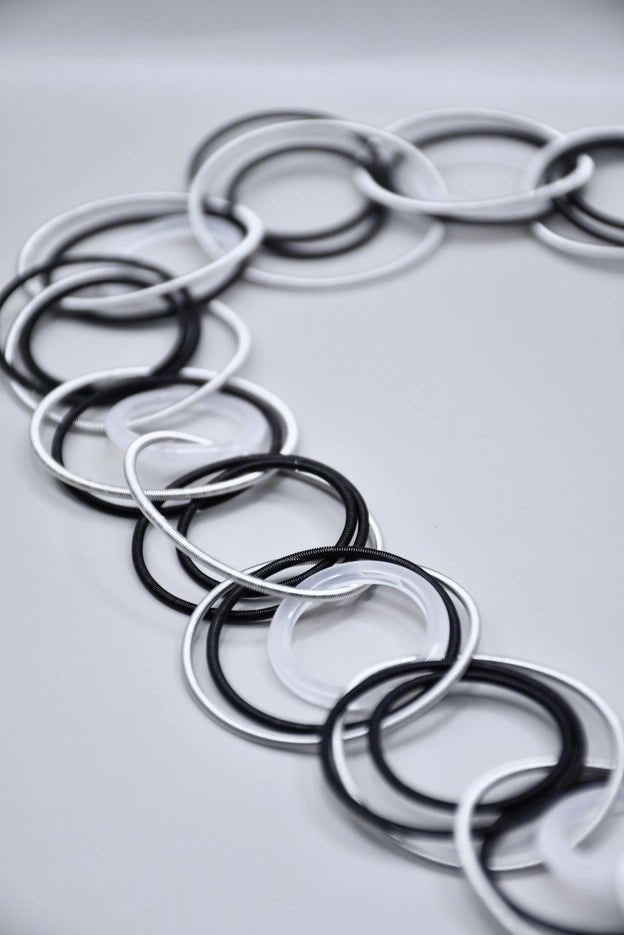 Silver, Black, and Clear Rings Necklace - The Weitzman Museum Store - L76H
